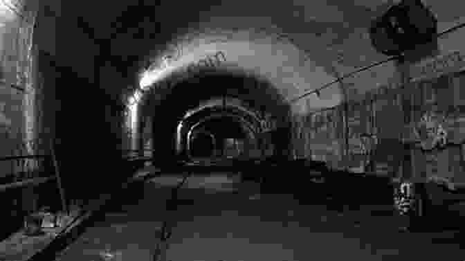 A Photograph Of The Abandoned Tunnels Beneath Five Points Station, Showing Their Brick Walls, Arched Ceilings, And Rusting Tracks. Atlanta Underground: History From Below