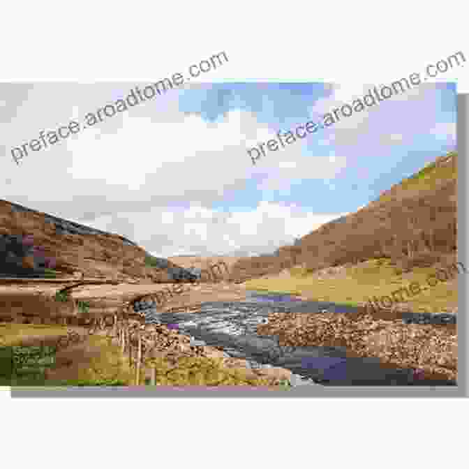 A Serene View Of Arkengarthdale Valley, Displaying The Lush Meadows, Meandering River Swale, And Rolling Hills Beyond. Scenic Walks In Upper Swaledale (Walks In Kirkby Stephen District 4)