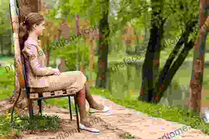 A Young Woman Sitting On A Bench In A Park, Looking Up At The Sky. She Is Smiling And Has Tears In Her Eyes. All This I Will Give To You