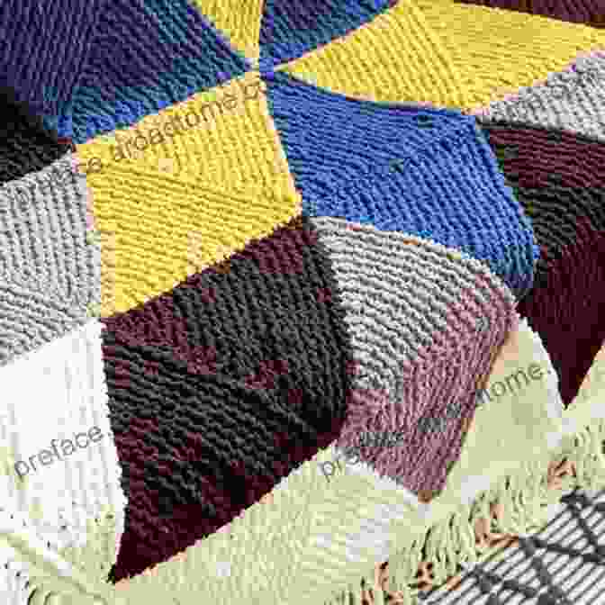 An Intricate Knitted Afghan Featuring A Vibrant Geometric Pattern 200 Ripple Stitch Patterns: Exciting Patterns To Knit And Crochet For Afghans Blankets And Throws