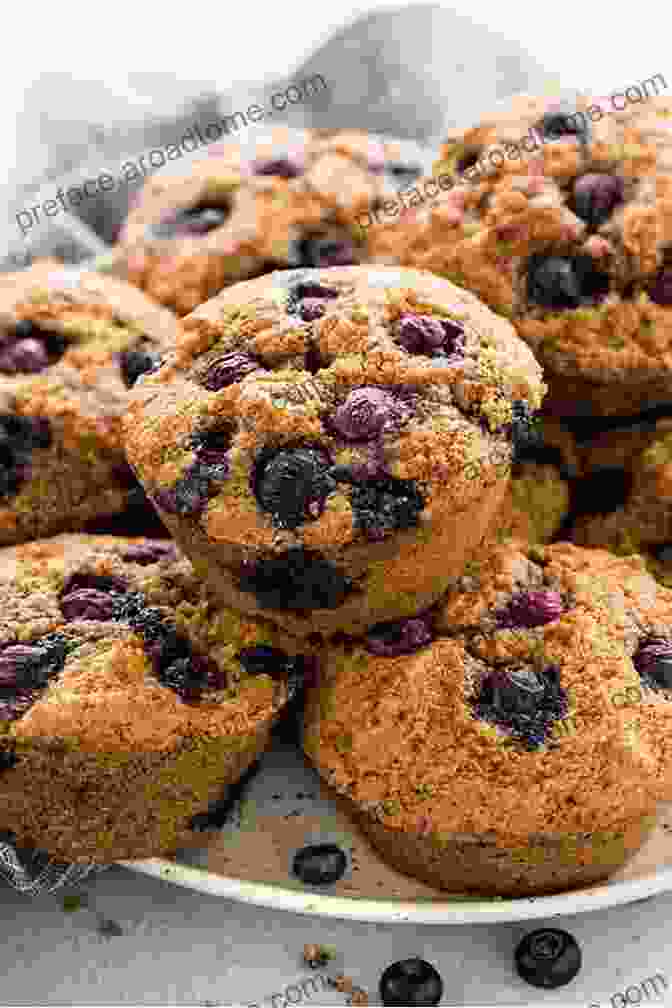 Delectable Paleo Blueberry Muffins Adorned With Fresh Blueberries Paleo Baking: 21 Delicious Paleo Baking Recipes For Paleo Lovers (muffins Pancakes Paleo Cookies Paleo Diet Paleo Cookbook Paleo Recipes)